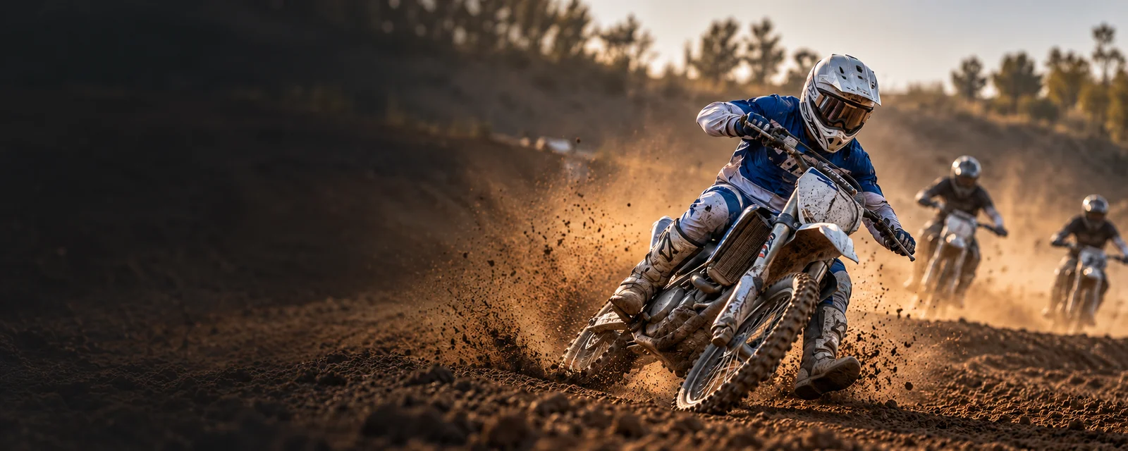 Illustrative motocross riders racing through a dusty corner